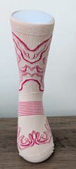 The sock seen front on, where the pink line-work is symmetrical either side of the shaft.
